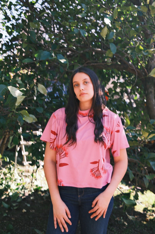 POLERA TORTUGA FLORES FUCSIA