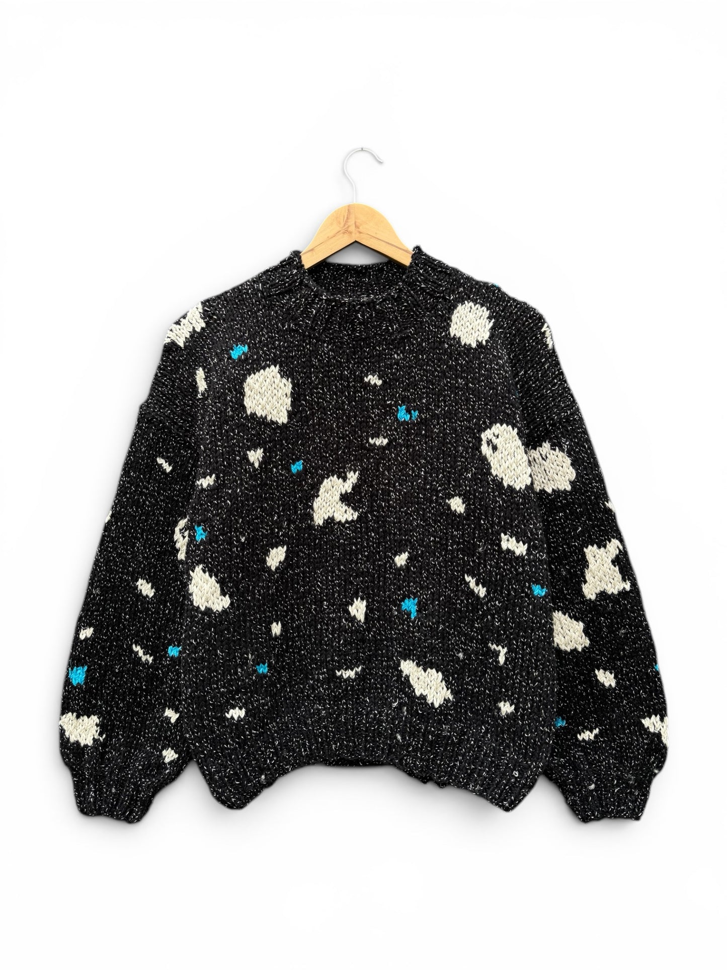 SWEATER ARENA NEGRO